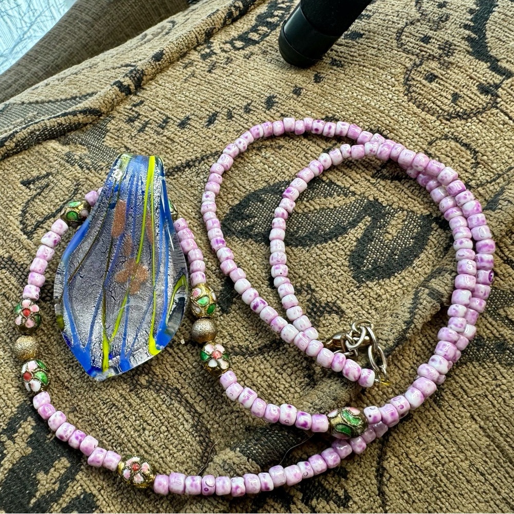 Glass pendant and beaded necklace.